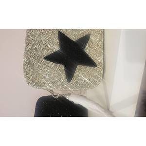 NEW MOYNA NEW YORK crossbody bag in gold with black star